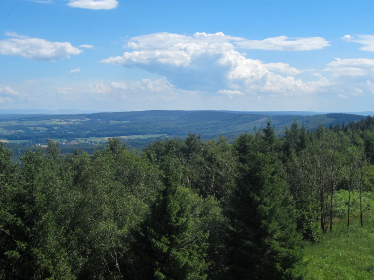 Forested ridge of the Eggegebirge in western Germany, with farmland and distant hills beyond